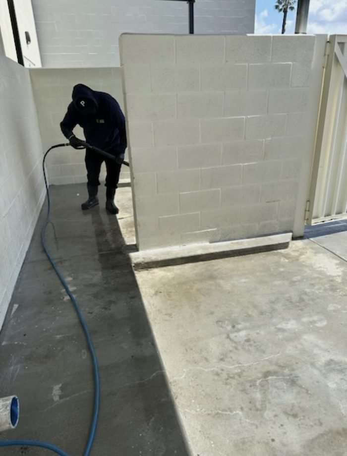 Commercial service-area or dumpster-enclosure cleaning
